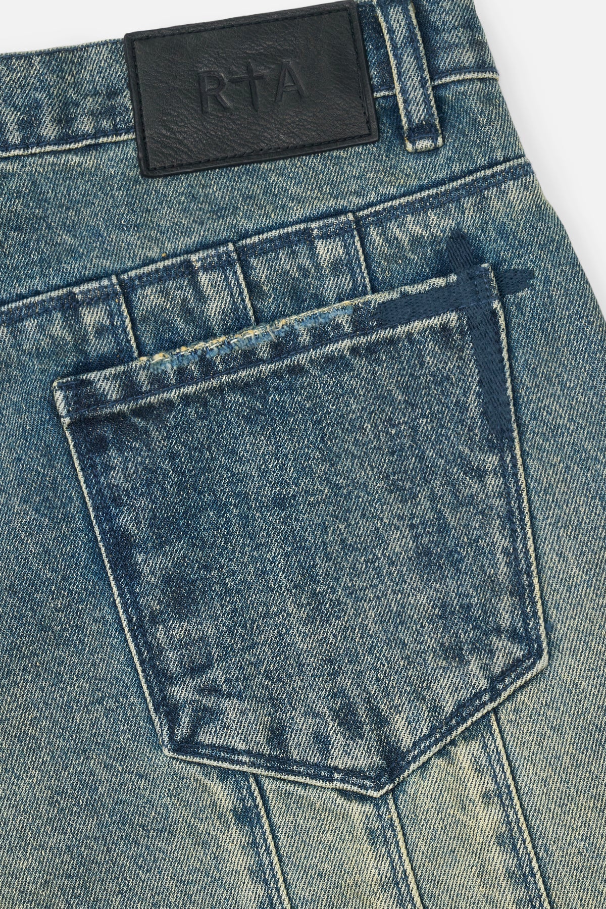 RTA Leather Patch on Vintage Wash Denim - Brand Detail | RTA