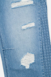 Distressed Denim Jeans with 3D Cross Embossed Side Seam Details - Close Up | RTA