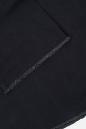 Washed Black Denim Raw Cut Hem Detail | RtA