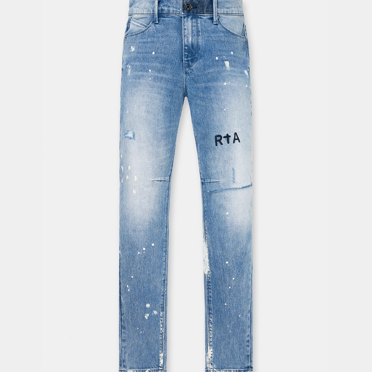 Light Blue Distressed Denim Clayton Skinny Jeans with White Paint Splatter - Flat Lay | RTA