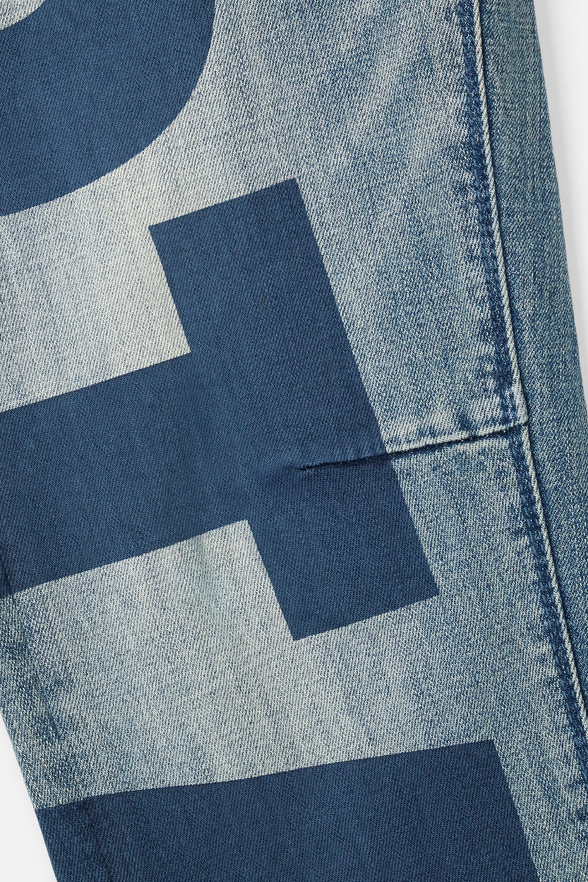 BRYANT SKINNY JEAN | MID BLUE LOGO