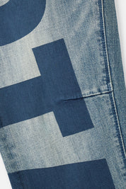 BRYANT SKINNY JEAN | MID BLUE LOGO