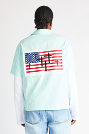 Light Blue Cotton Erik Double Layer Shirt with American Flag Cross Print - Back View On Model | RTA