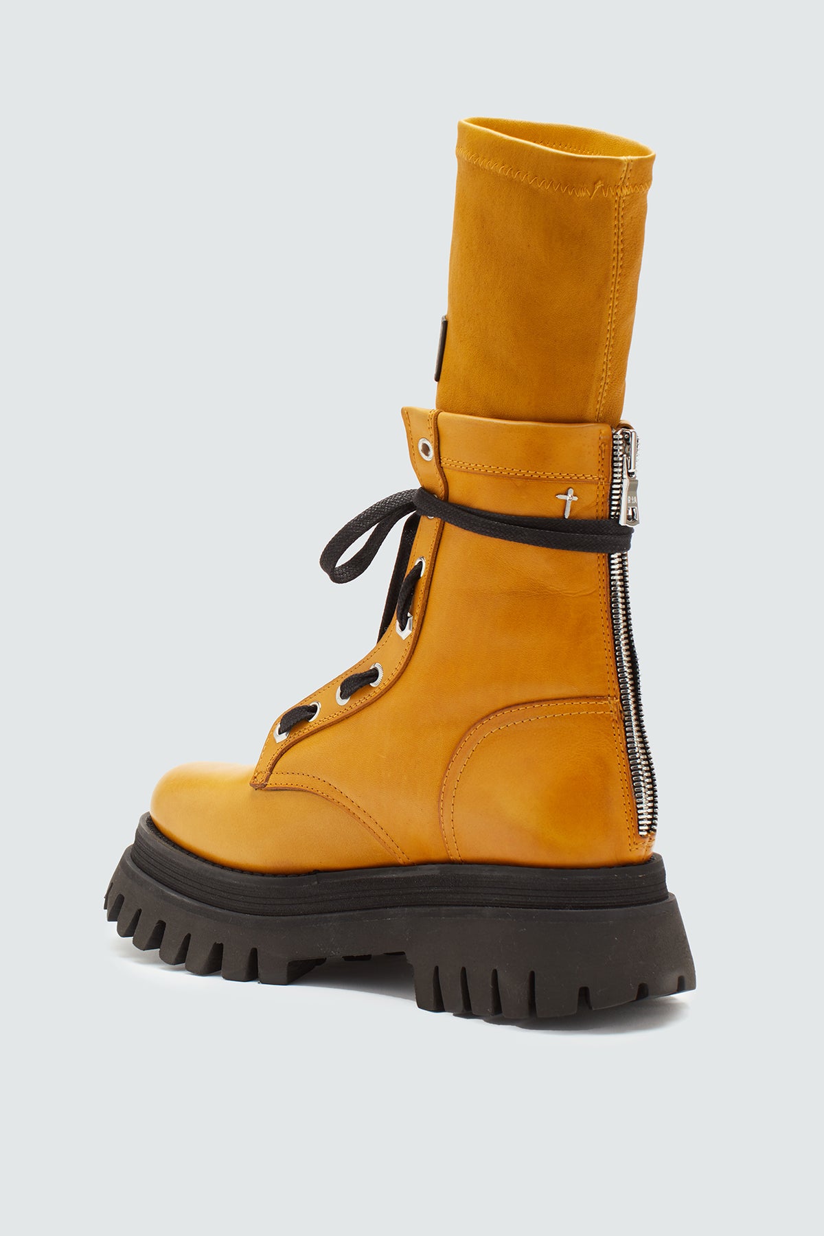 Women's zip-up leather combat boot in mustard yellow