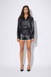 Black Vegan Leather Track Shorts - Front Full-Length On Model, White Piping Hem | RTA